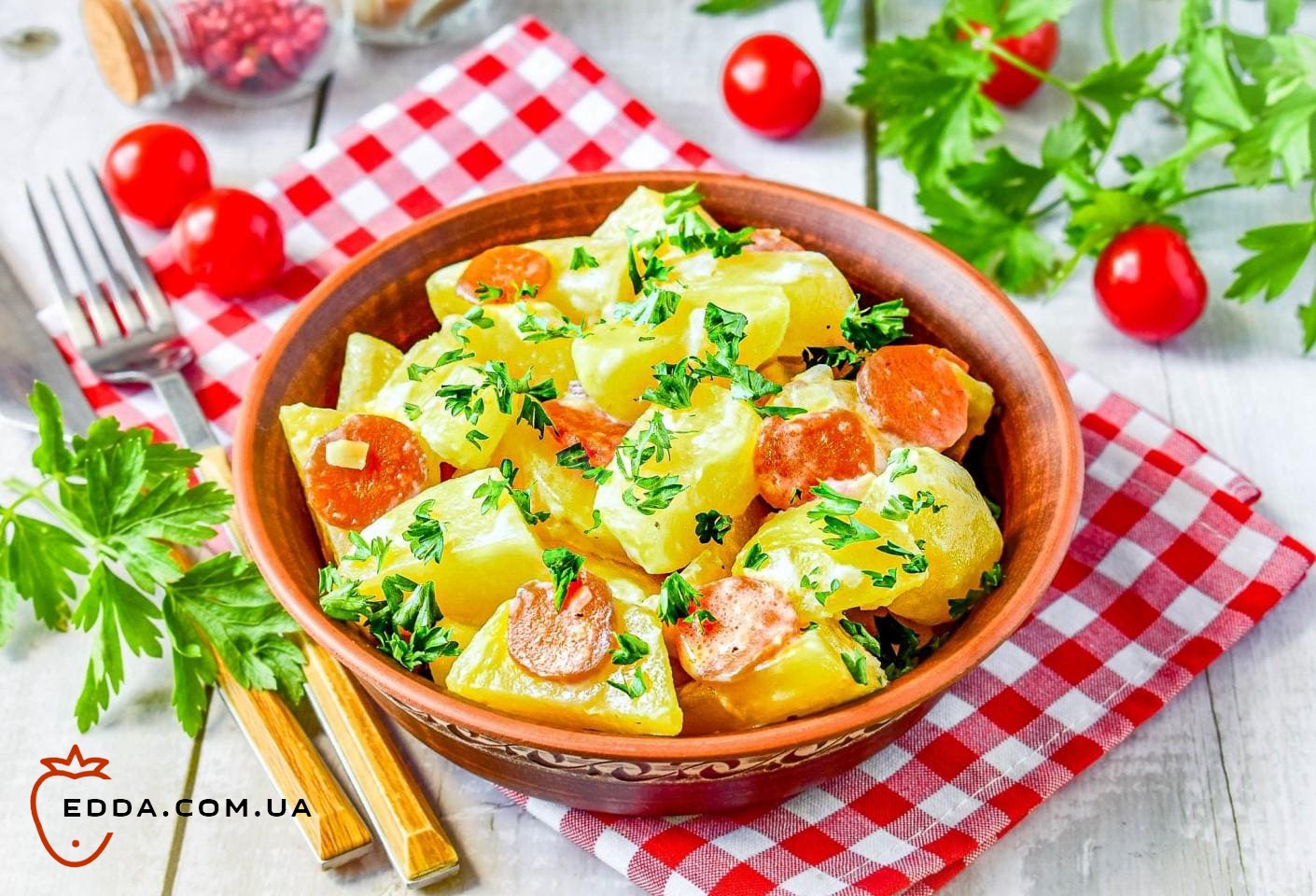 Картопля тушкована в сметані