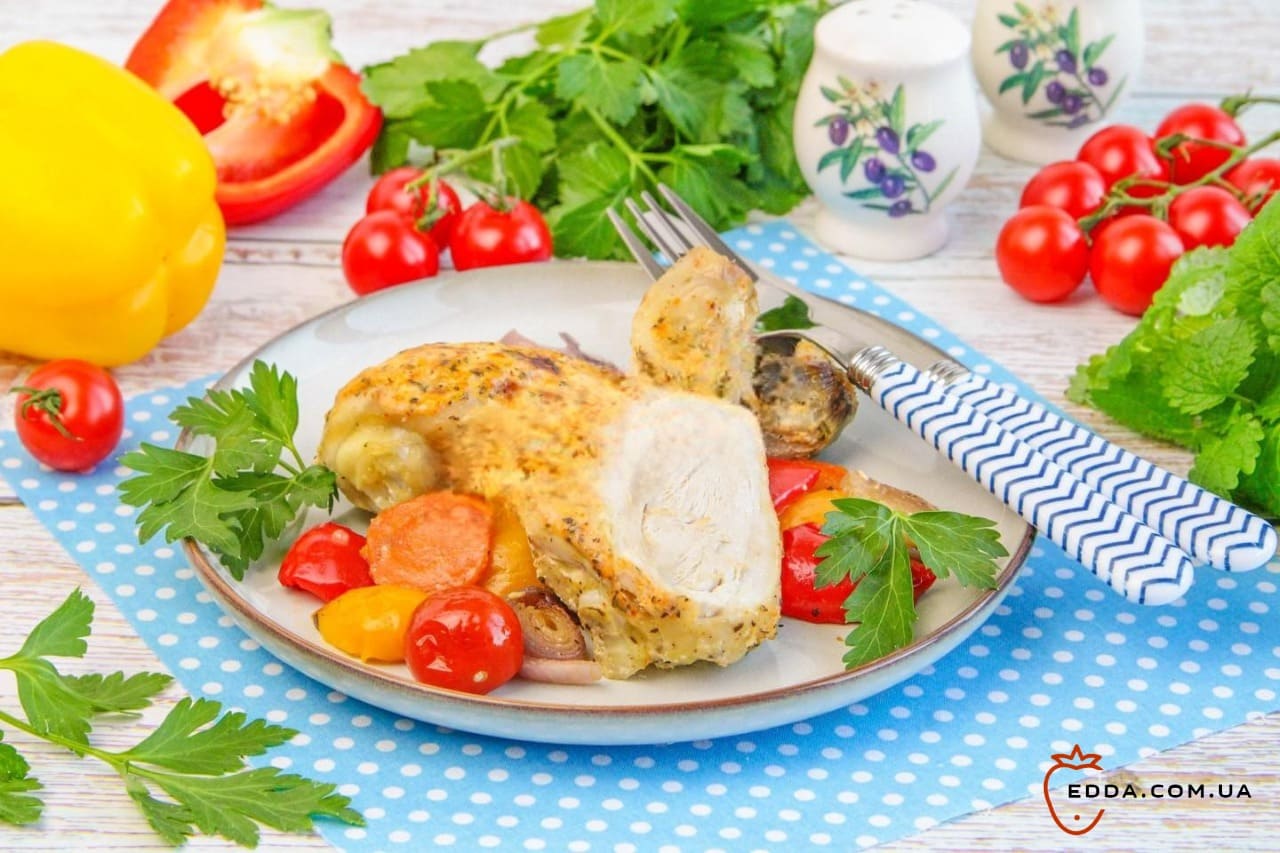 Курячі гомілки з овочами в духовці